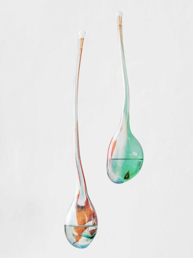 Among old and new Friends suspended glass work